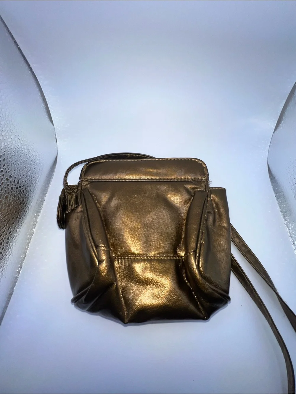 Vintage metallic bronze crossbody purse manufactured by the brand Beverly Hills